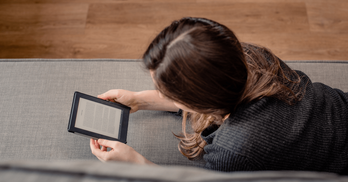 woman reading on ereader