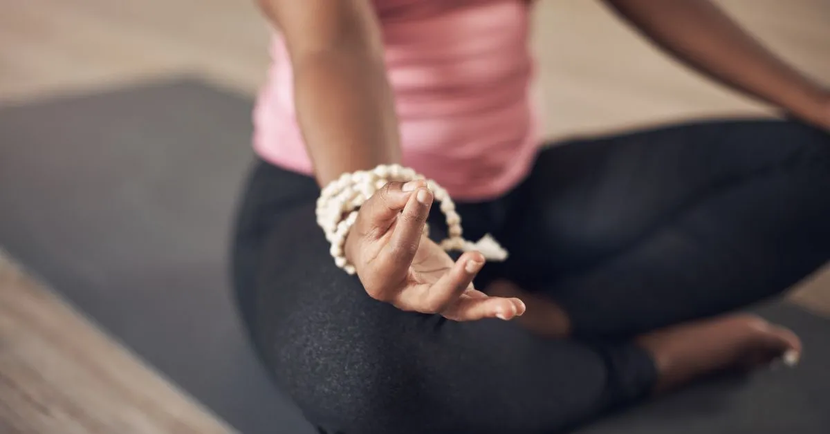 Woman manifesting with yoga